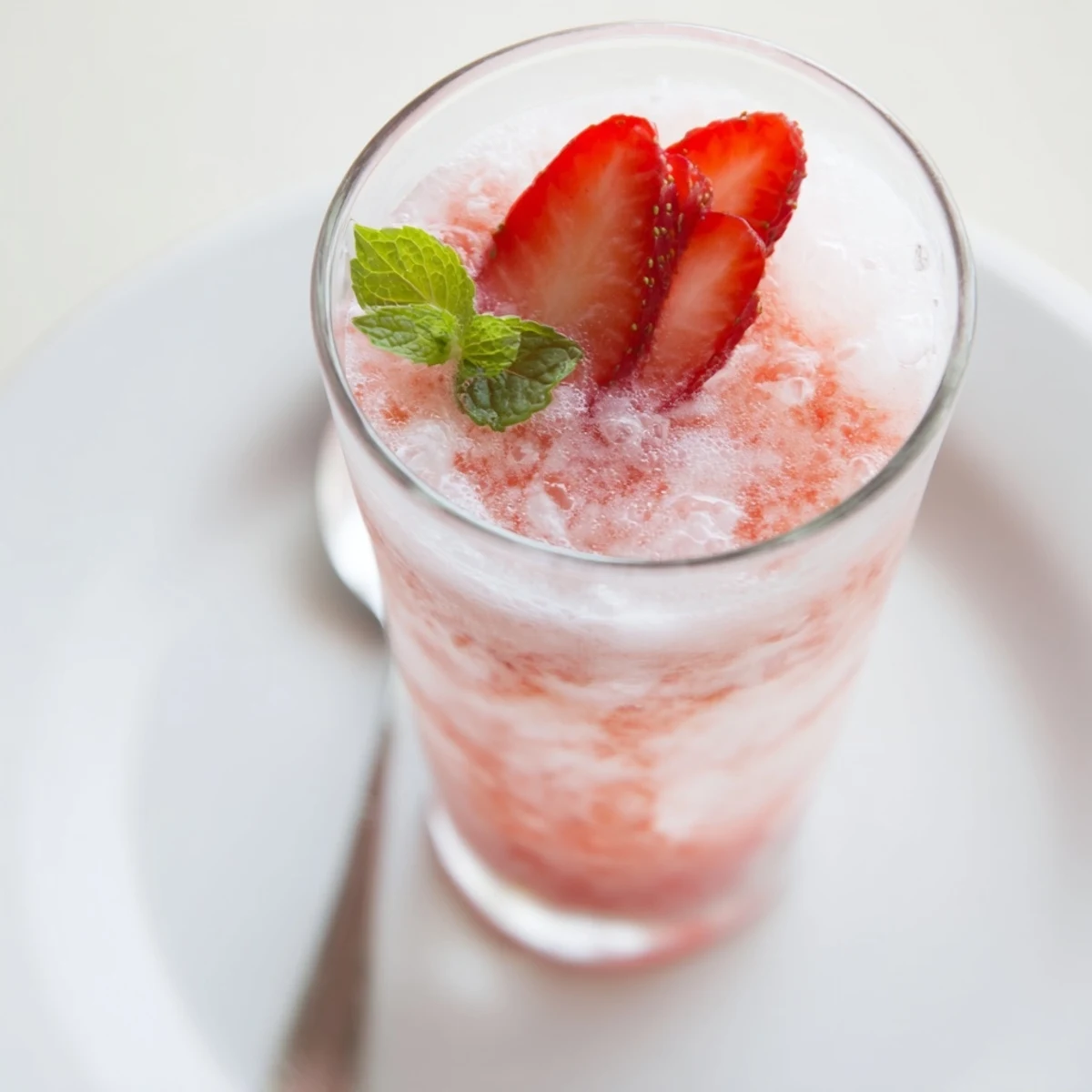 Easy Strawberry Coconut Cooler Recipe blended with lime, creamy texture, party-ready