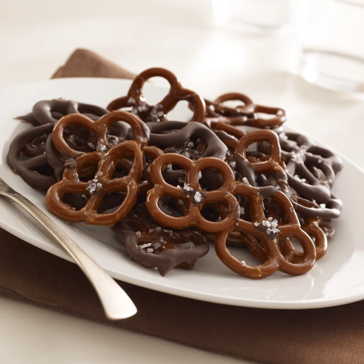 Crunchy pretzel twists covered in caramelized butter toffee with a generous dark chocolate glaze.